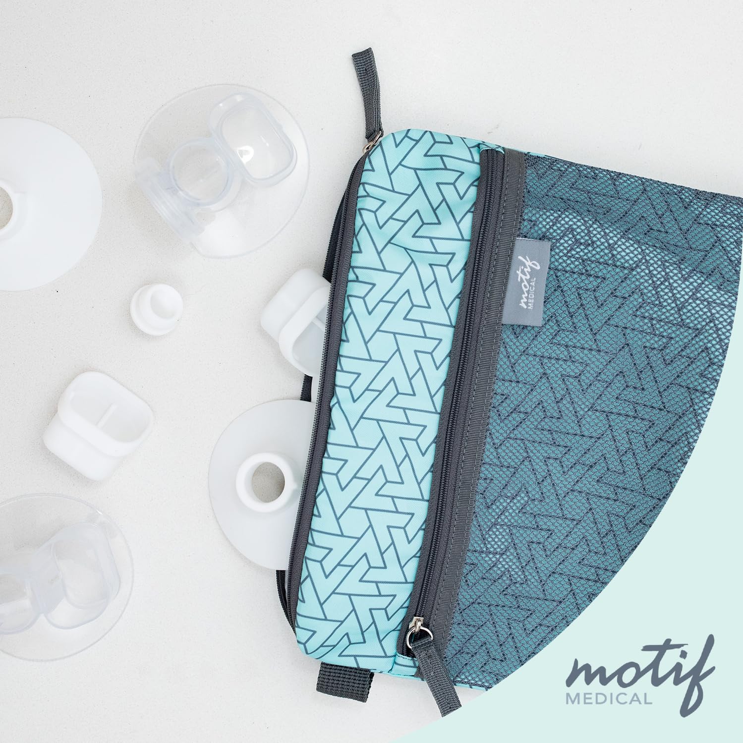 Motif Medical wet dry bag aqua dual compartments simplify organizing pump parts and swimsuits.