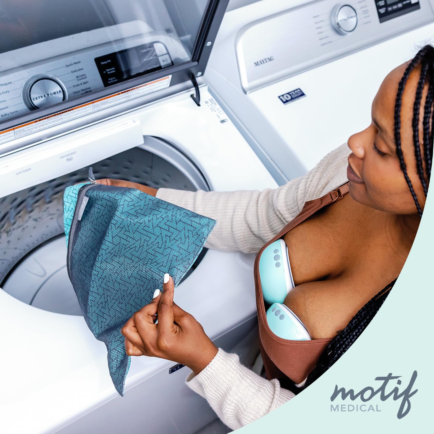 Motif Medical baby wet dry bag aqua durable travel essential for messy outings.