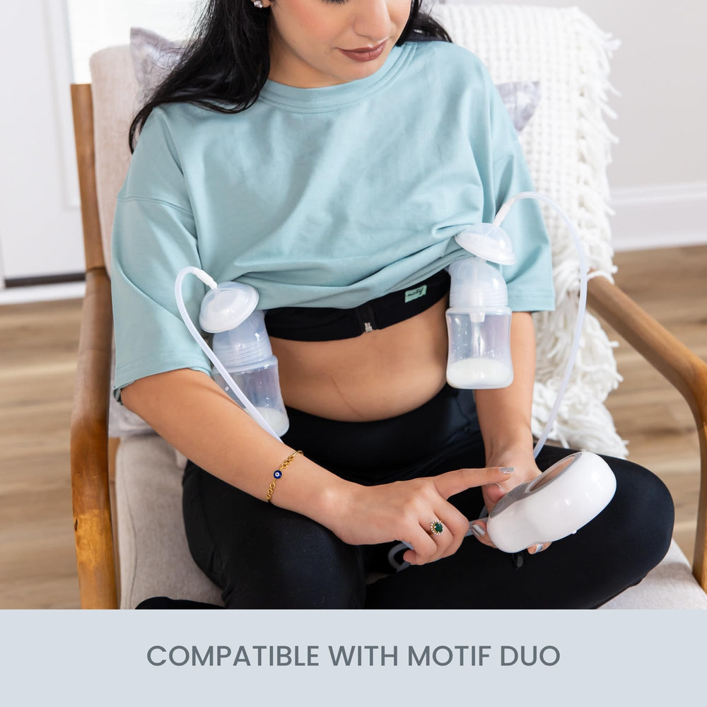 Motif Medical Duo bottle caps and nipples arranged for clean feeding.