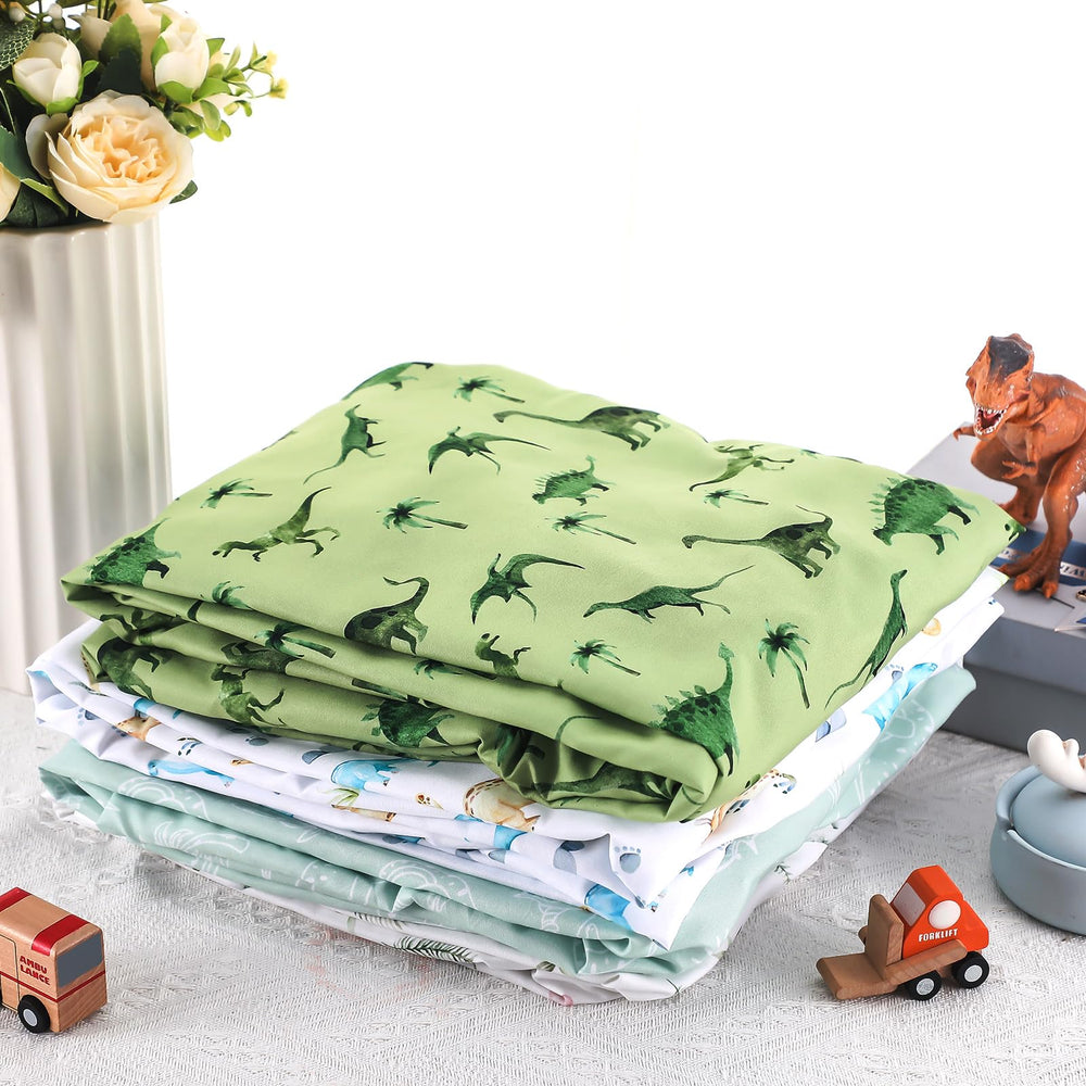 Moukeren ink wash dinosaur crib sheets closeup fabric highlights soft microfiber touch and breathable comfort.