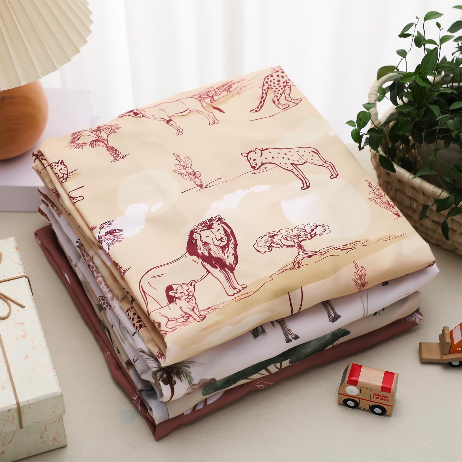 Moukeren tropical animals crib sheet pattern 6 includes four patterns in one set.