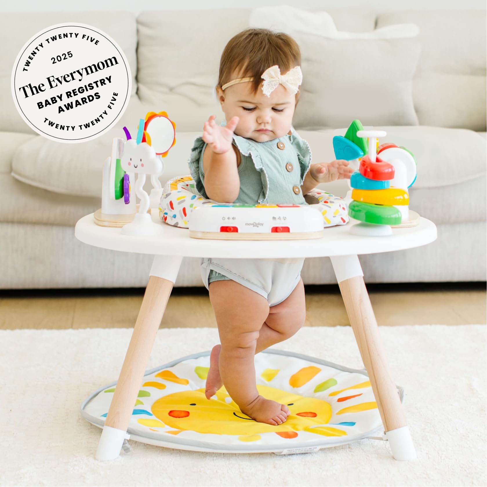 Move2Play 4-in-1 activity center in tummy-time stage encouraging reaching and head control.