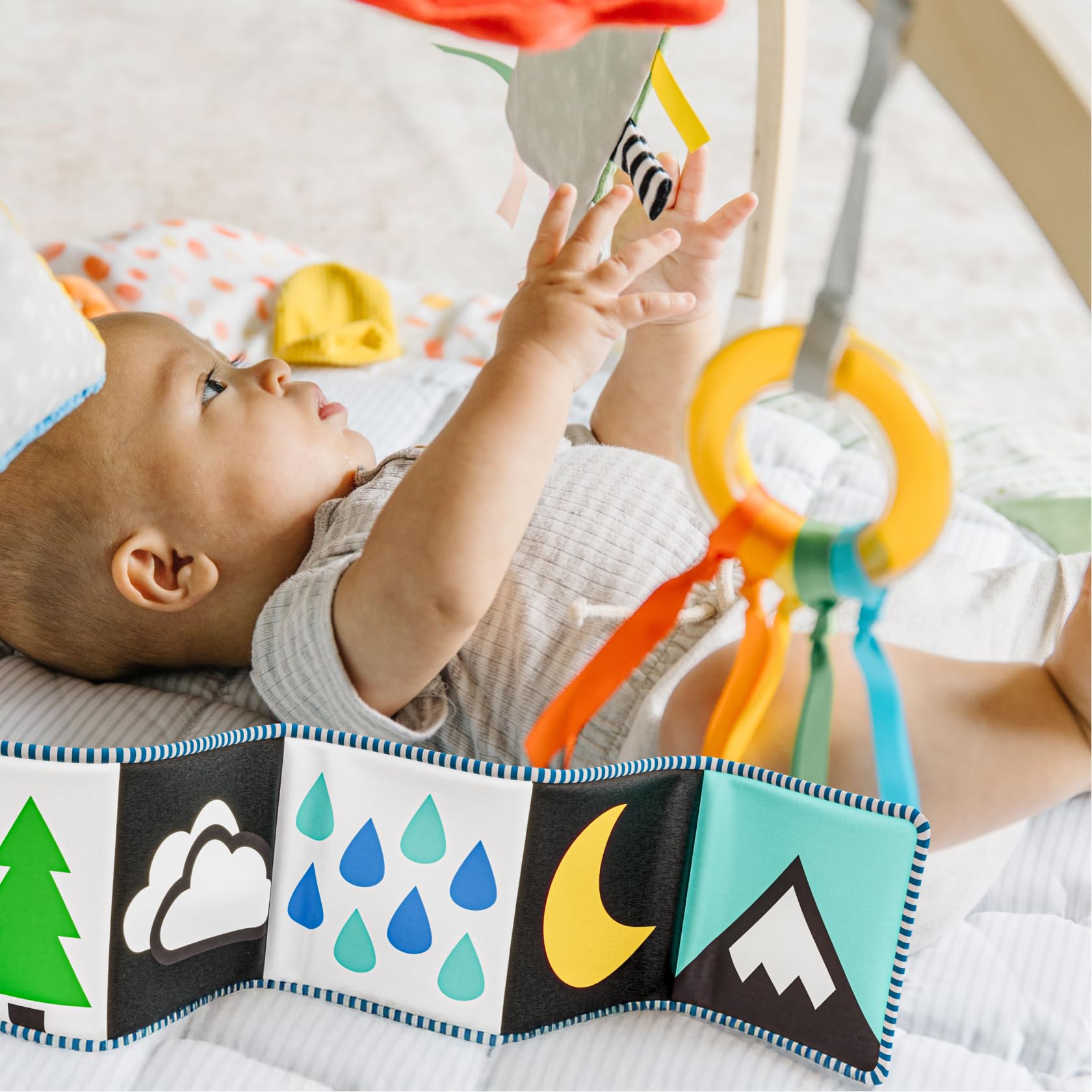 Move2Play modern design and beechwood frame complement nursery decor.