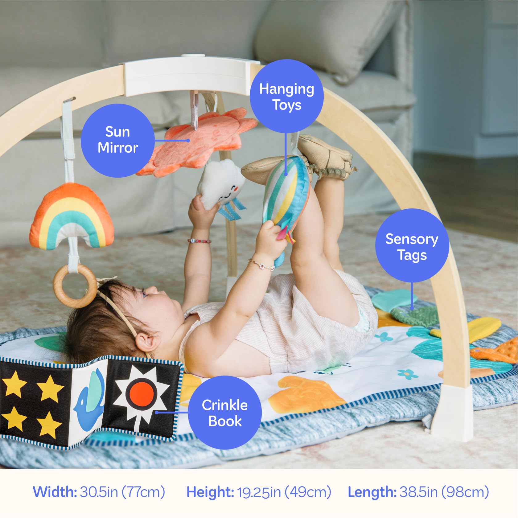 Move2Play montessori toy crinkle tags promoting grasping and tactile exploration.