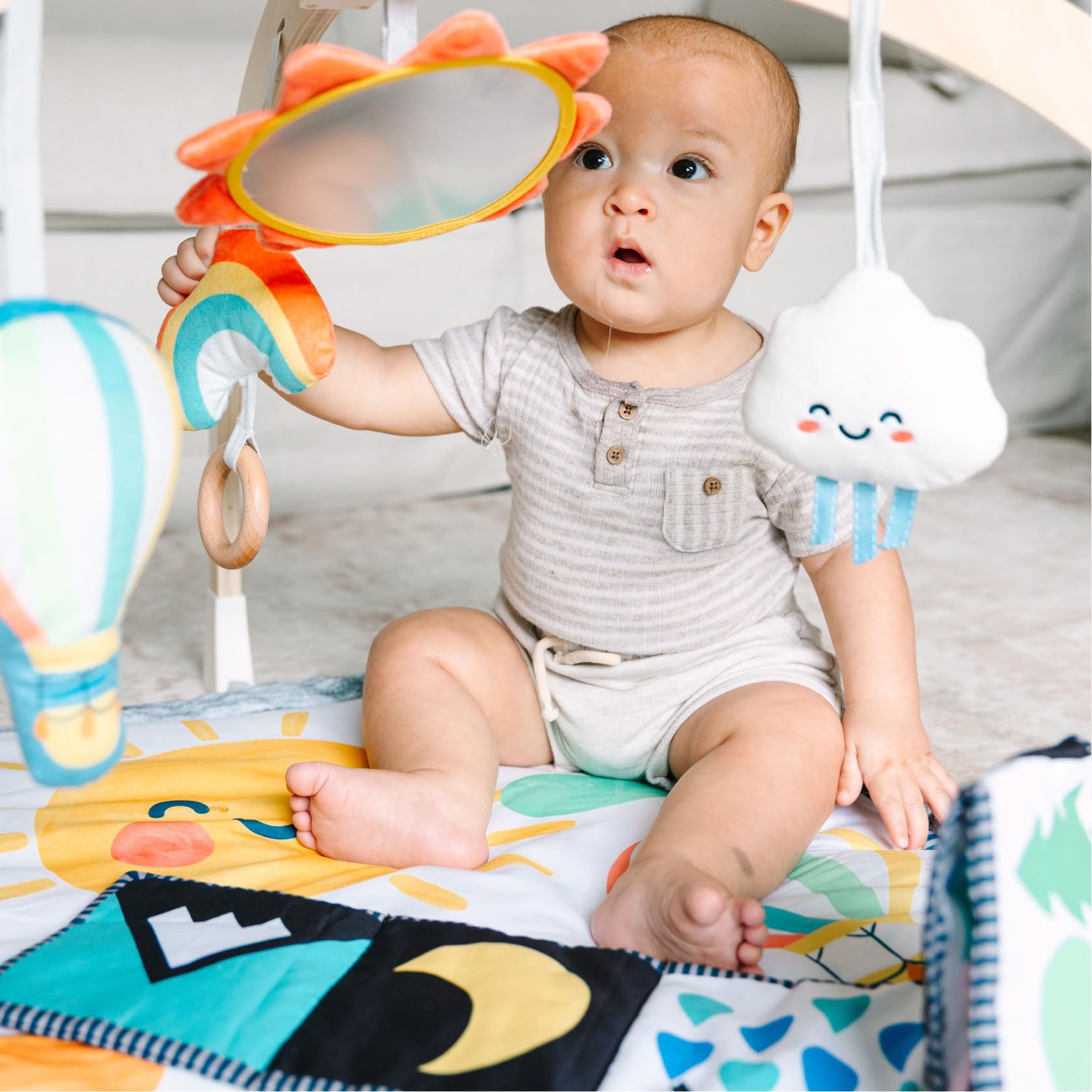 Move2Play montessori toy wooden teether provides safe teething relief and grip.