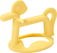 MOYUUM silicone pony teether worn on wrist for easy handling and teething relief.