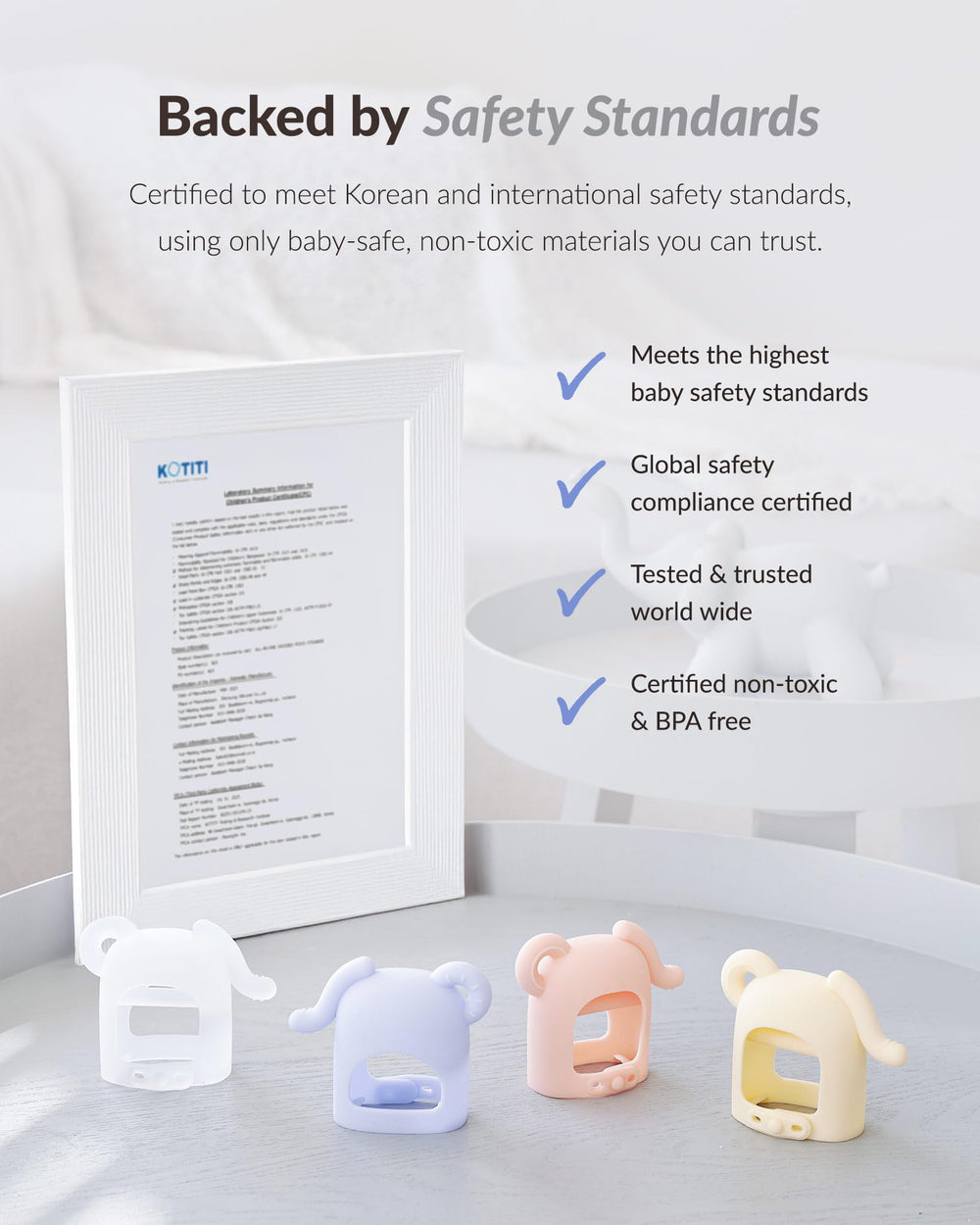 MOYUUM glove-design teether stays on baby's hand.