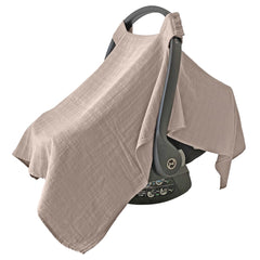 MOZAH baby car seat cover warm taupe close-up shows soft organic muslin texture for baby comfort.