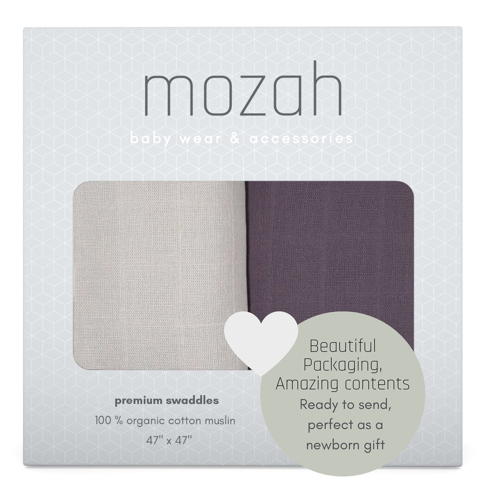 MOZAH baby swaddle time in crib illustrating easy, soothing wrap for restful sleep.