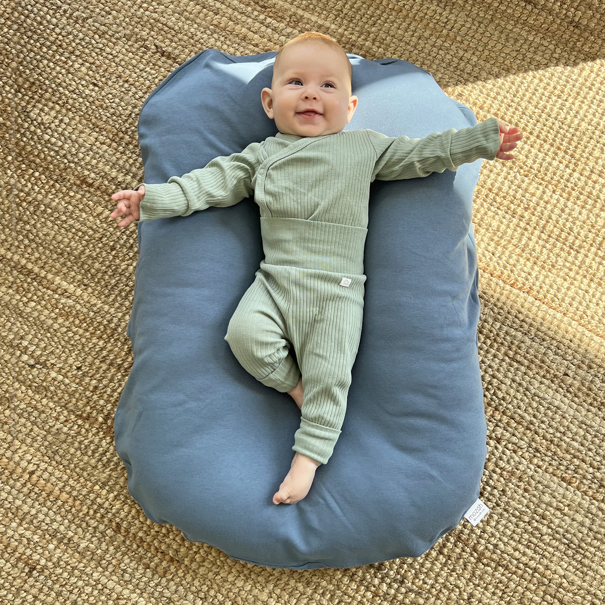 MOZAH fits Snuggle Me Organic loungers showing versatile newborn compatibility.
