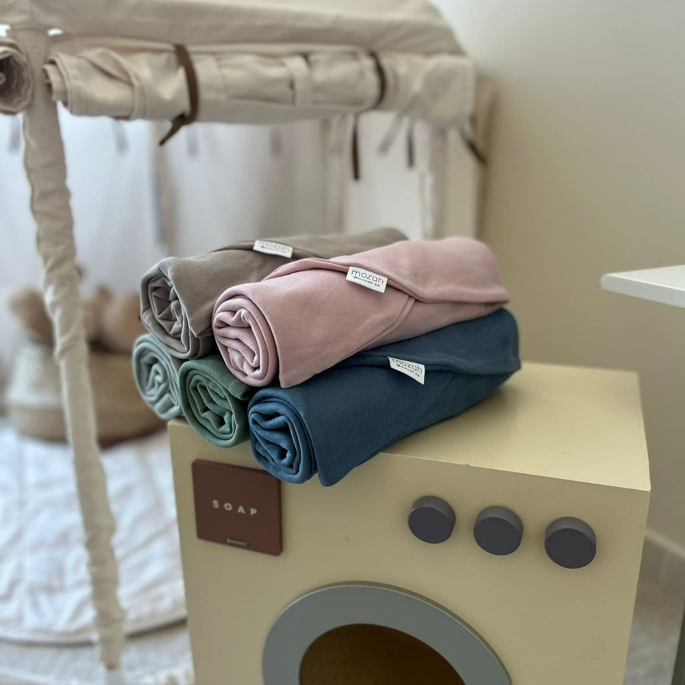 MOZAH Newborn Lounger Cover Belgian Grey product shot shows soft fabric