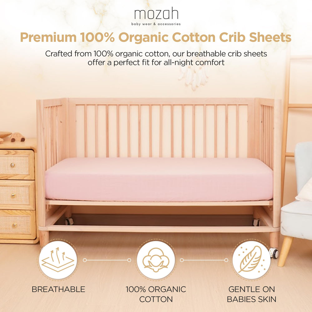MOZAH organic muslin crib sheets demonstrating snug fit on standard crib