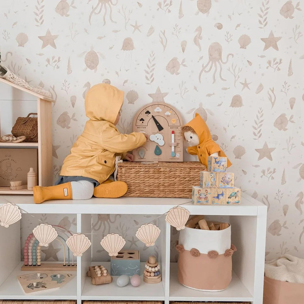 MRYAWXBK nursery shelf decor blocks arranged as playful coastal display