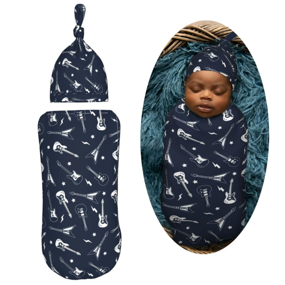 Muishi guitar and stars swaddle pattern on baby demonstrates secure cocoon for soothing sleep.