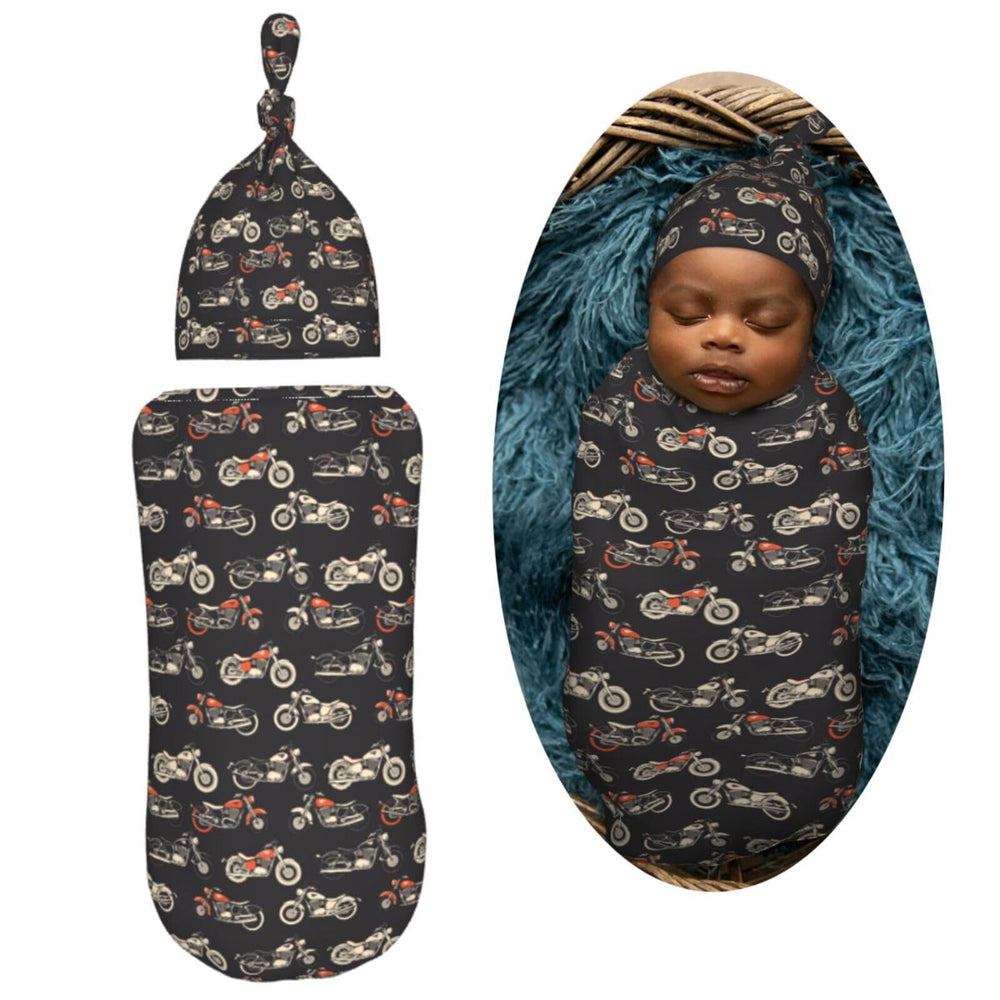 Muishi motorcycles-on-black-background swaddle blanket detail highlights elastic edge for secure wrapping.