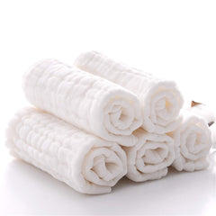 MUKIN washcloth close-up showing soft cotton muslin texture for newborn comfort.