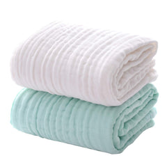 MUKIN baby towels with white honeycomb embossing for fast absorption.