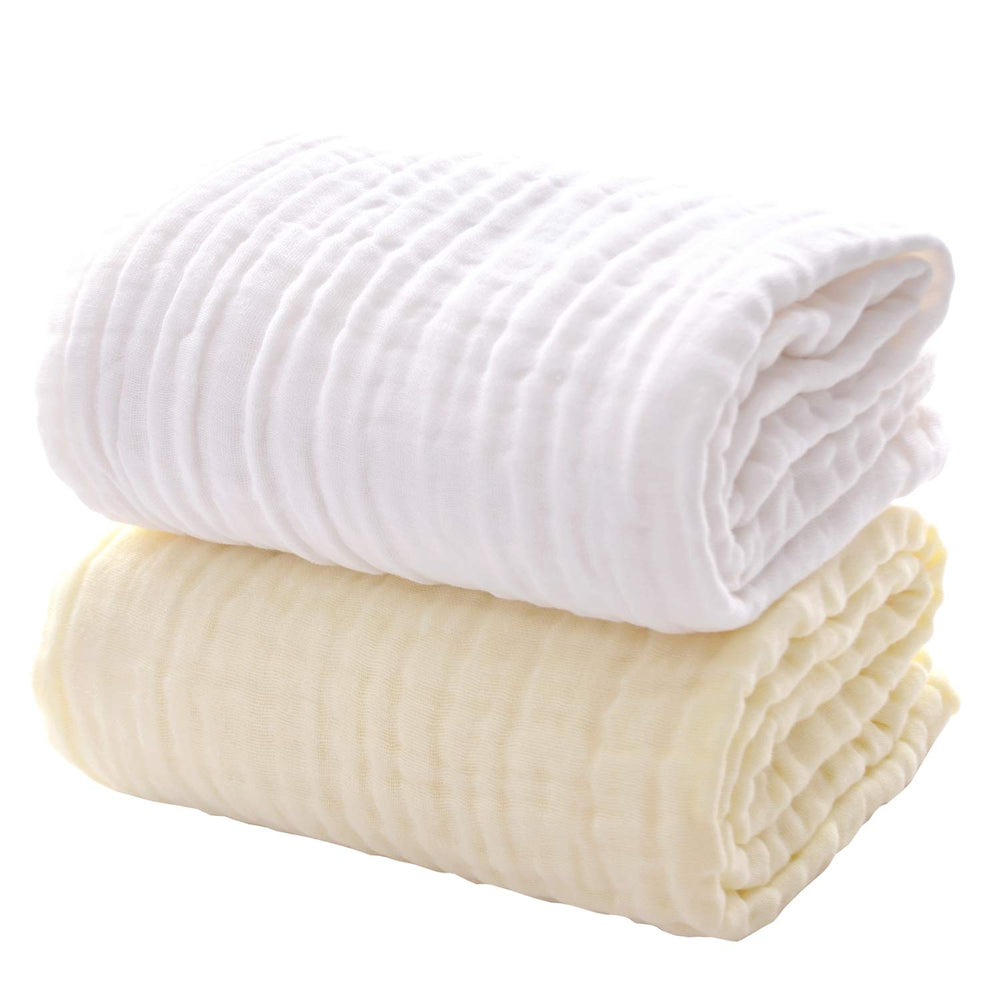 MUKIN baby towels white-yellow stack shows ultra-soft cotton and quick absorbency.