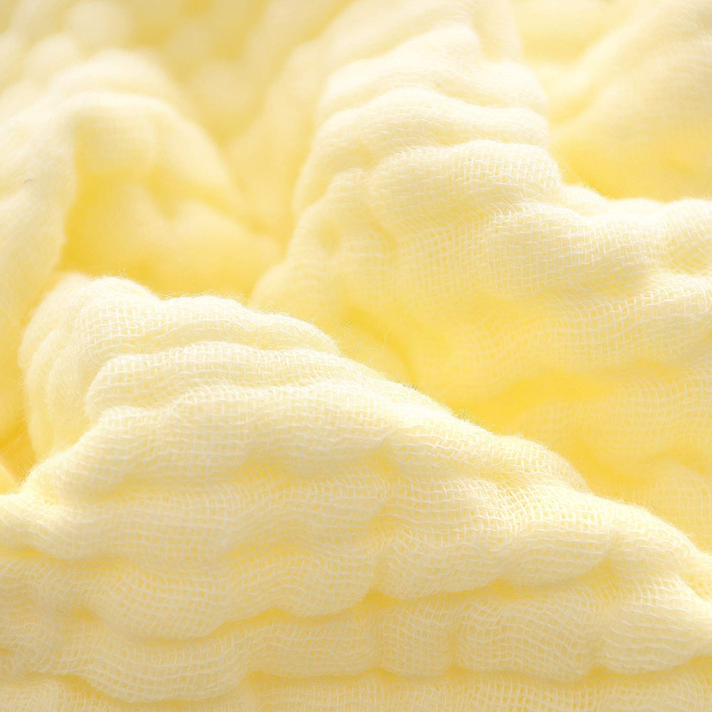 MUKIN cloth used on baby face for soft, thorough cleansing.
