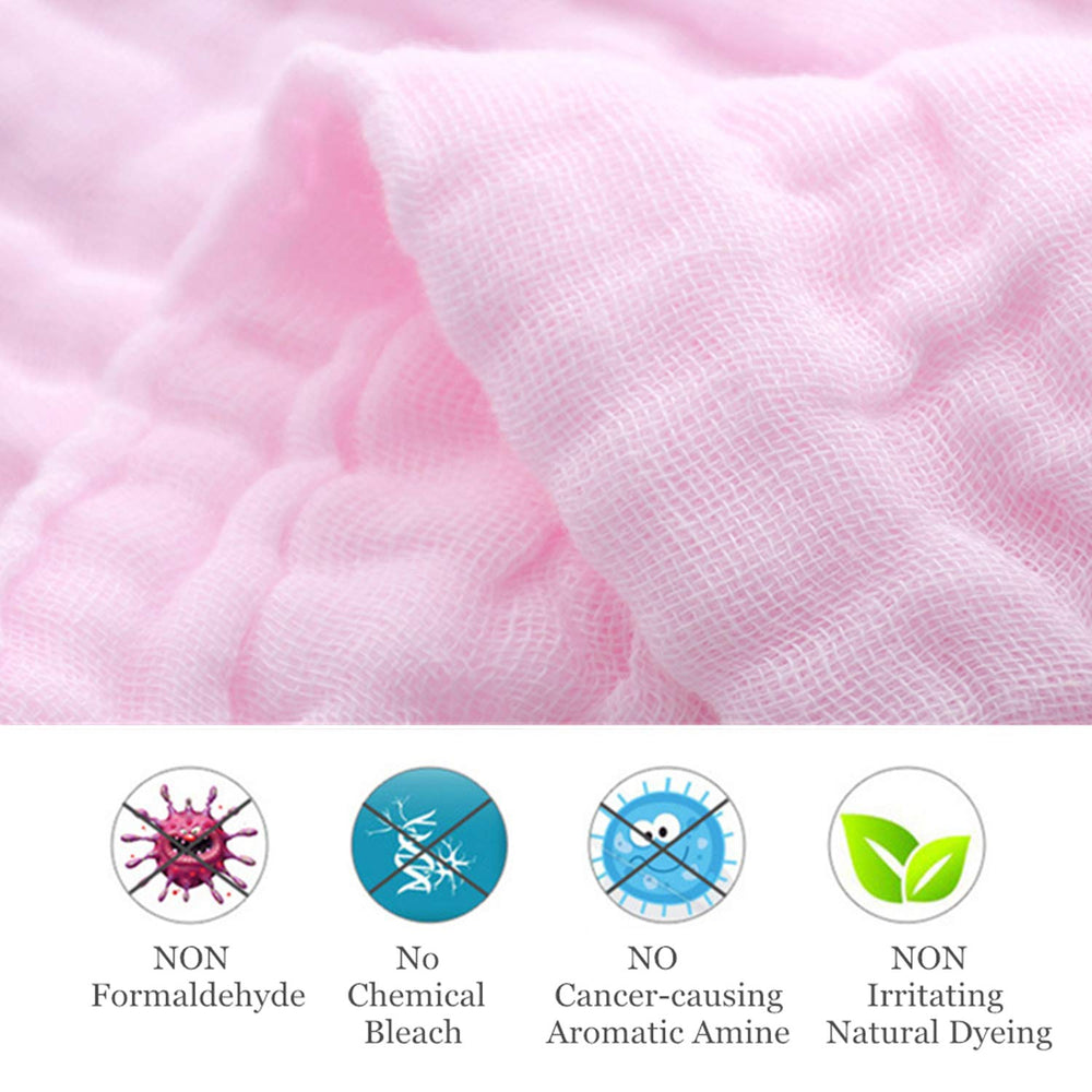 MUKIN washcloths held in adult hand for delicate cleaning.