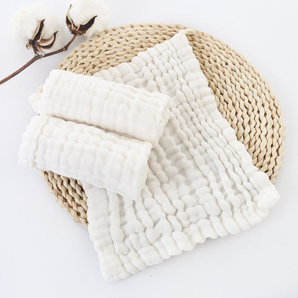 MUKIN machine-washable washcloths stacked in nursery storage.