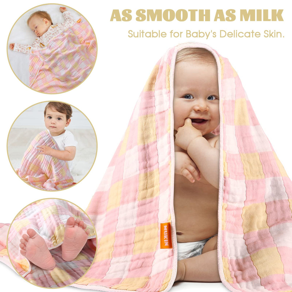 MUKIN cotton swaddle blanket folded in yellow emphasizes gentle, breathable baby warmth.