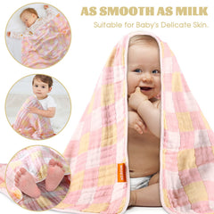 MUKIN cotton swaddle blanket folded in yellow emphasizes gentle, breathable baby warmth.