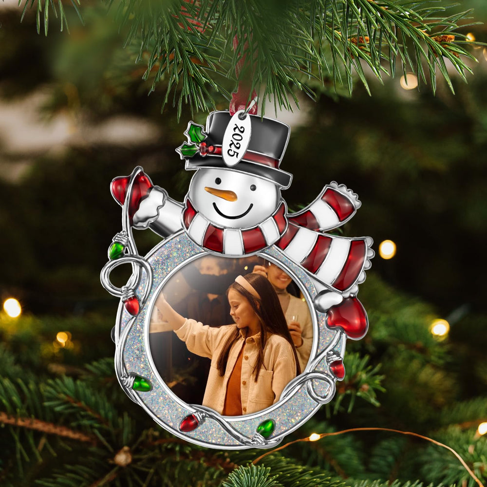 Mulumu ornament on a tree and window display adds cozy holiday ambiance.
