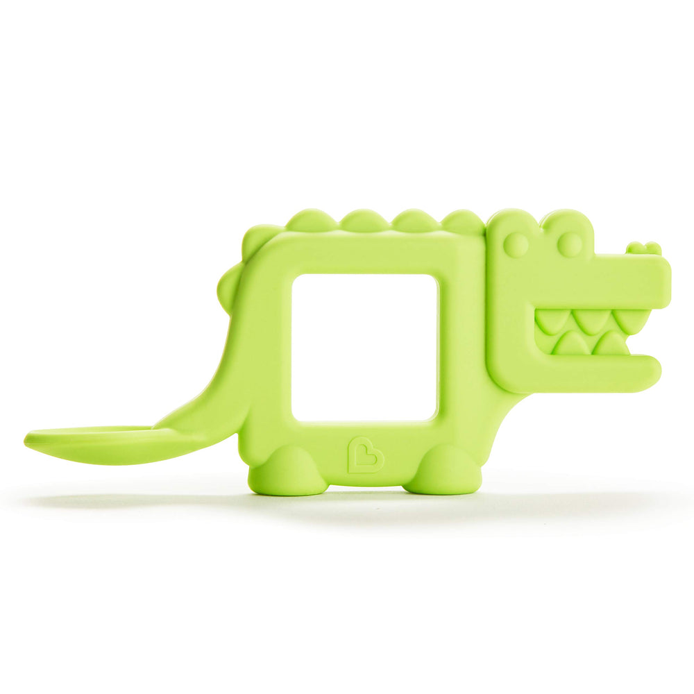 Munchkin The Baby Toon Alligator silicone close-up highlighting FDA-grade safety and gentle texture