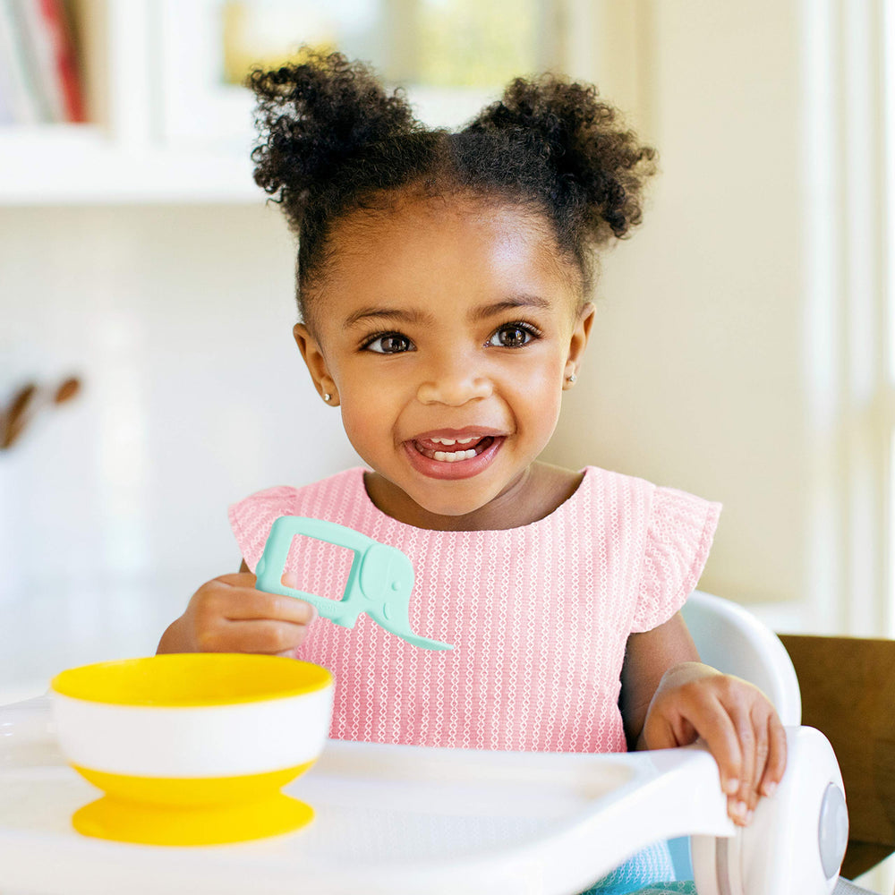 Munchkin Baby Toon Silicone Teether Spoon FDA-grade silicone for safe soothing meals.