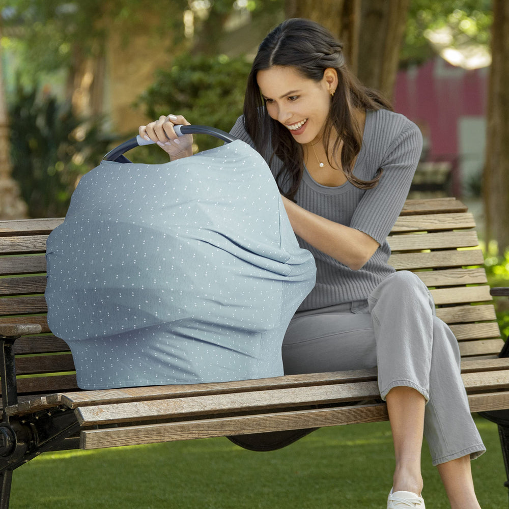 Munchkin Milkmakers shopping-cart cover protects against germs while baby sits.