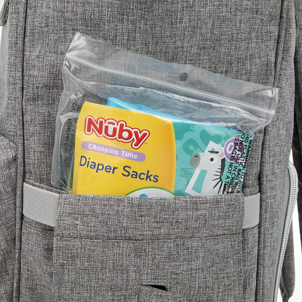 Munchkin on-the-go diaper disposal scene emphasizing convenience