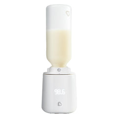 Munchkin Simple Touch Bottle Warmer base: compact platform for stable, mess-free heating.