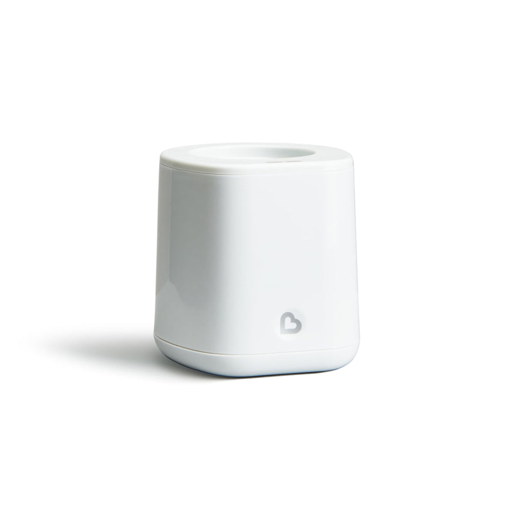 Munchkin Simple Touch Bottle Warmer no water reservoir removes measurement steps.