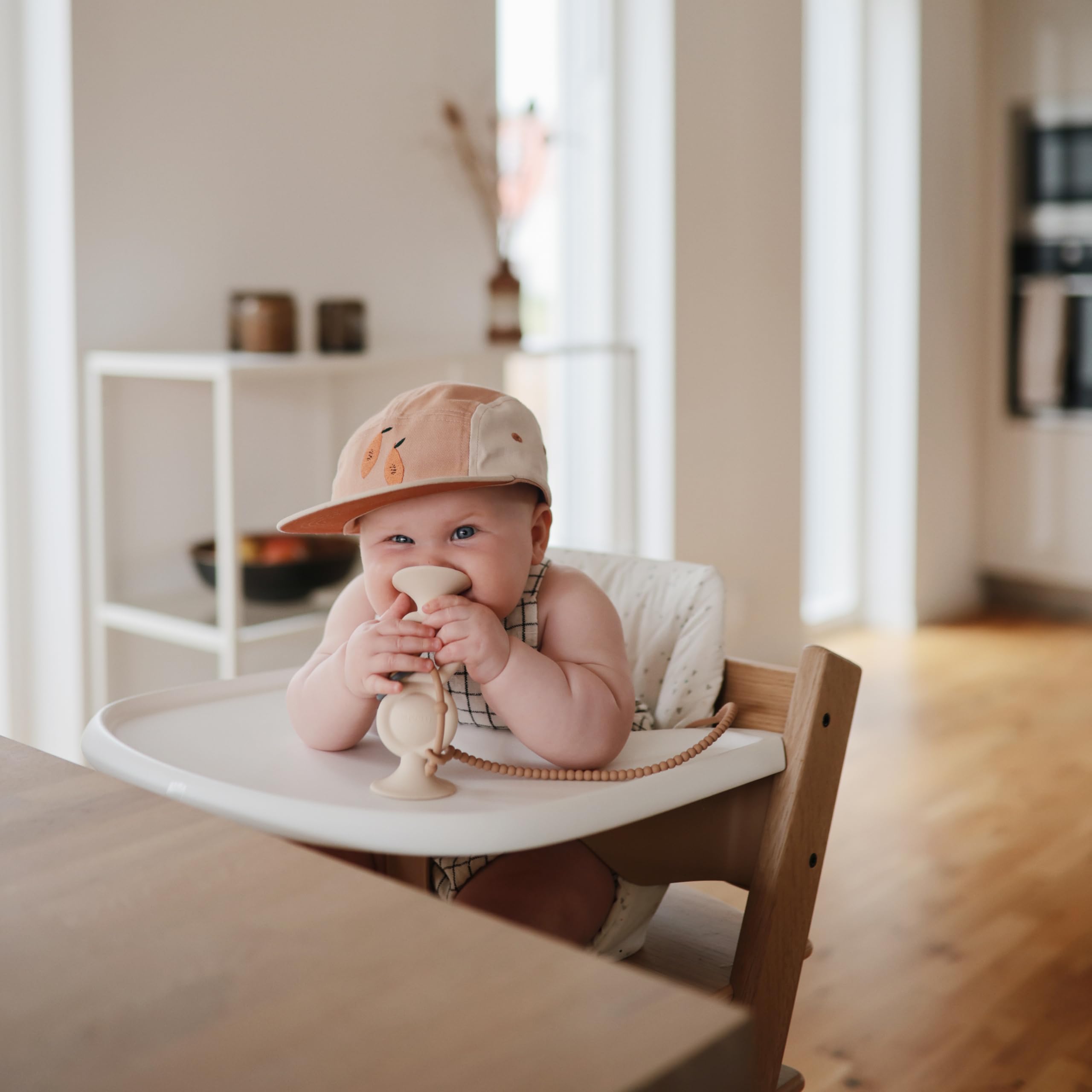 Mushie close-up shows soft, food-grade silicone for safe baby items.