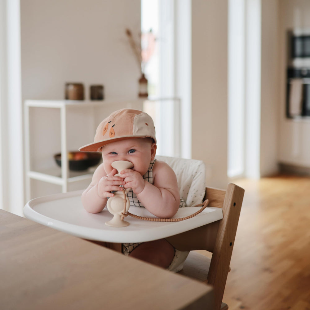 Mushie close-up shows soft, food-grade silicone for safe baby items.