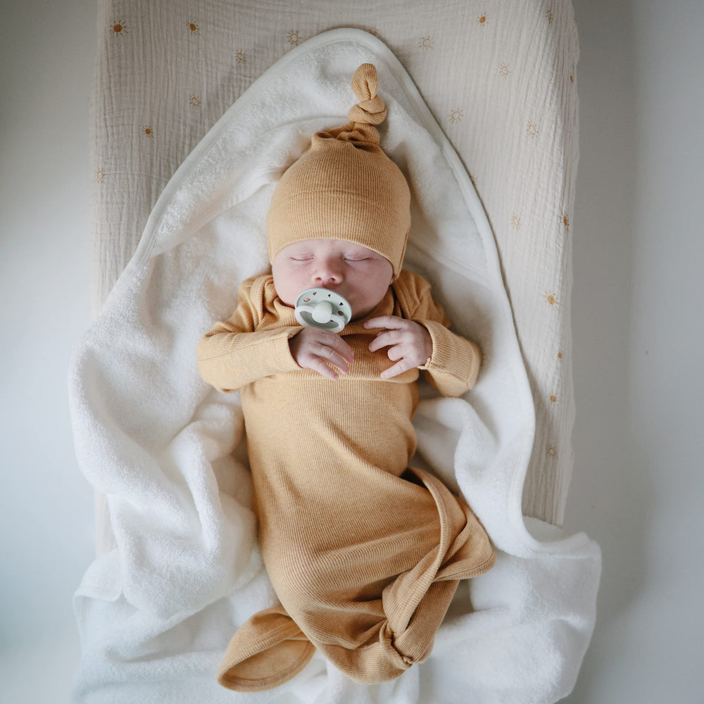 Mushie baby hooded towel pearl flat-lay to highlight dimensions 30.5 by 30.5 inches.