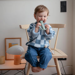 Mushie baby teether soft silicone color demonstrates non-toxic material for teething journeys