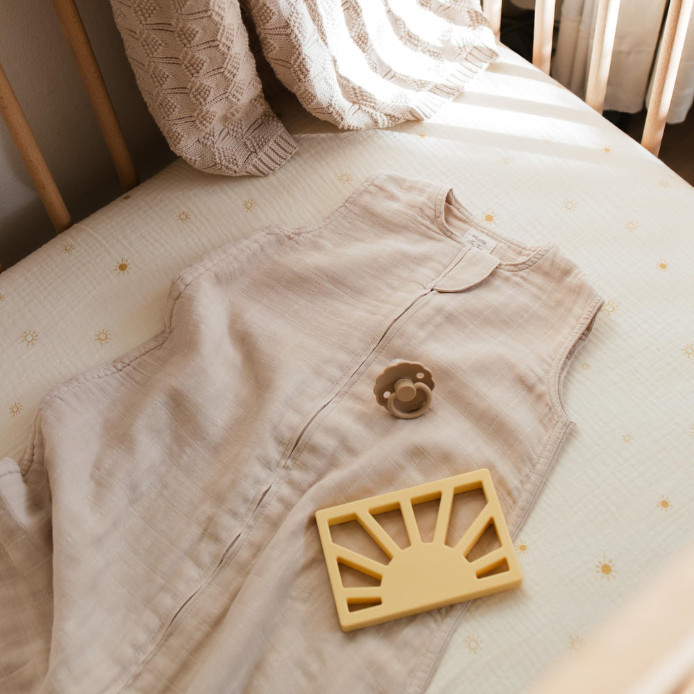 Mushie 0.5 TOG Sage blanket suitable for light layering.