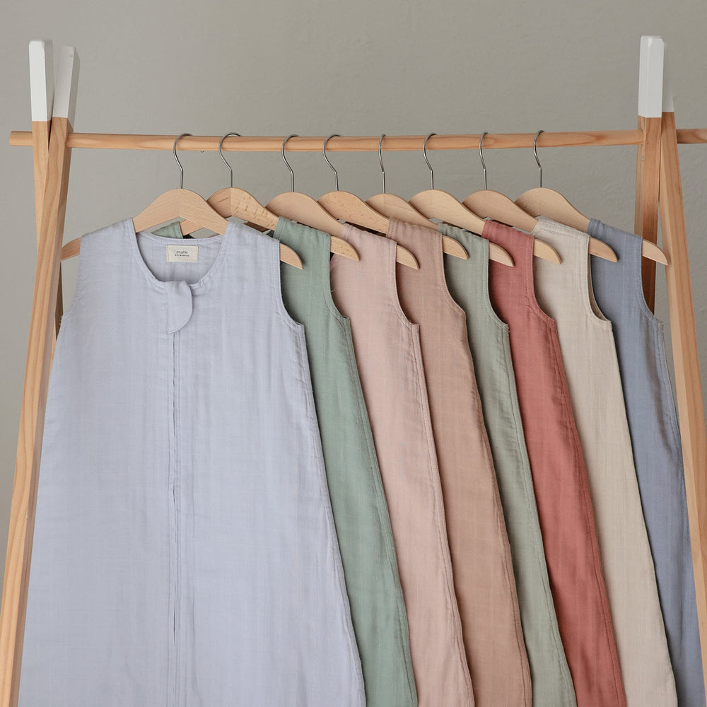 Mushie story behind Sage wearable blanket emphasizing safety and calm.