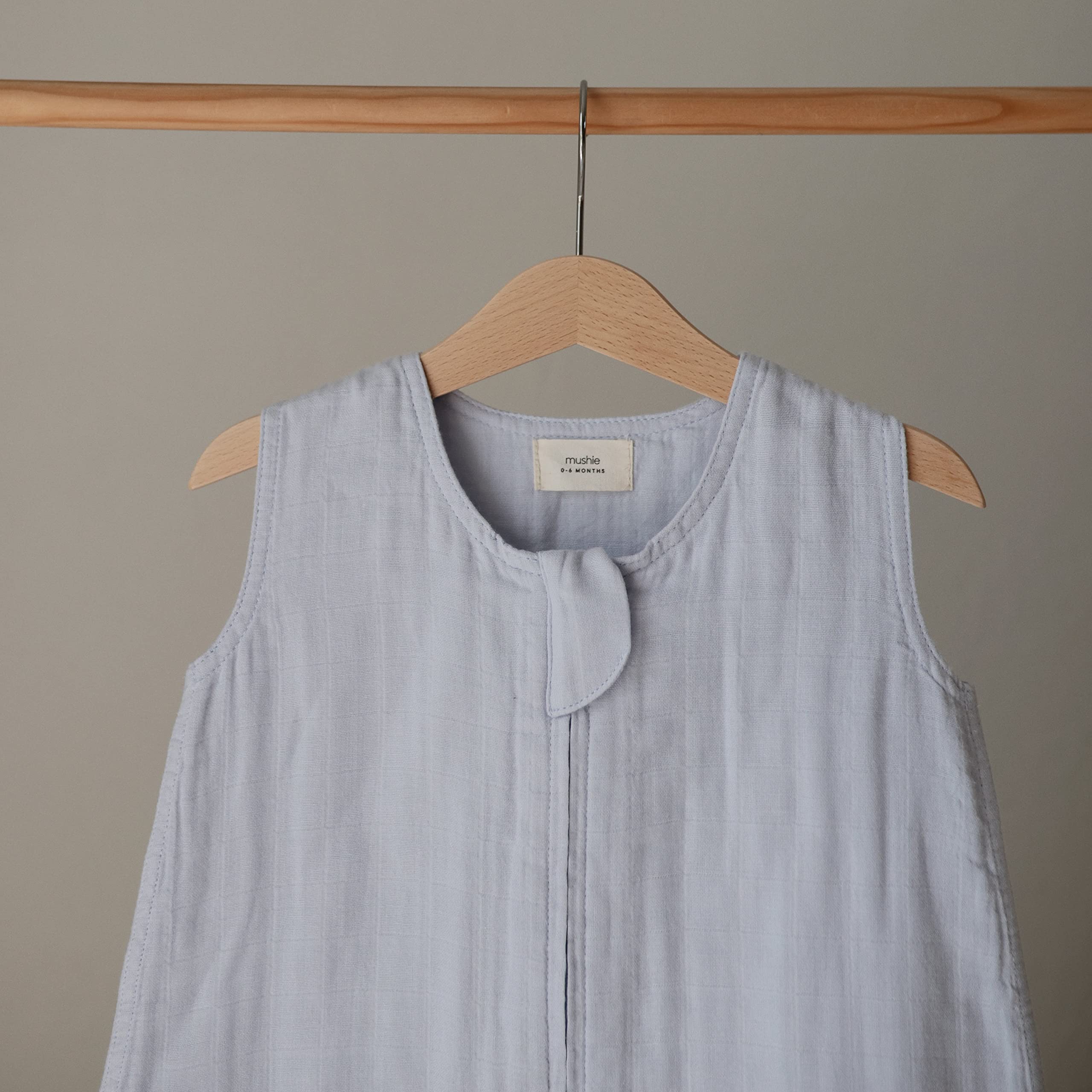 Mushie wearable blanket sleeveless design supports free leg movement and safe sleep