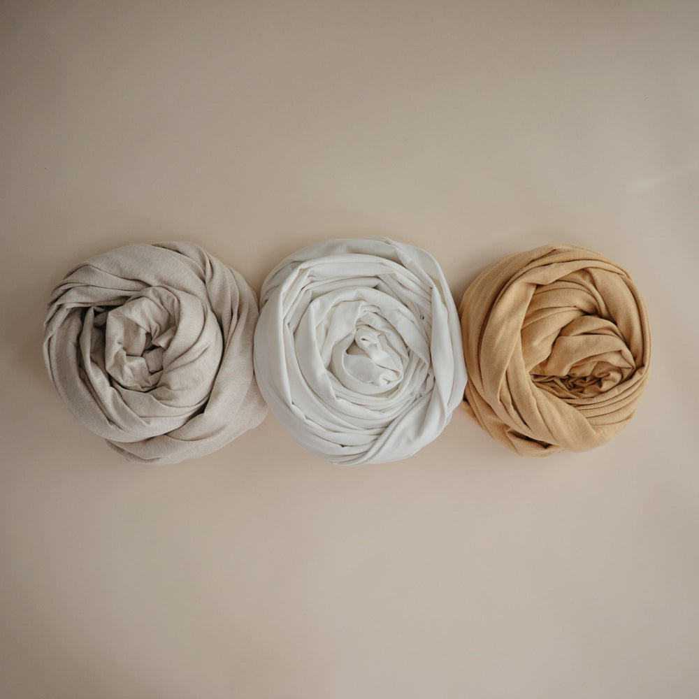 Mushie wrap breathable fabric helps keep baby cool and comfortable.