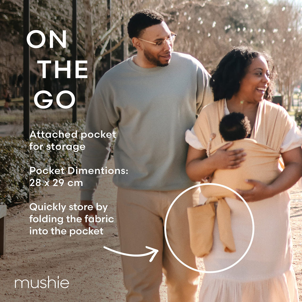 Mushie baby wrap cedar on-the-go setup inspires effortless baby wearing throughout errands