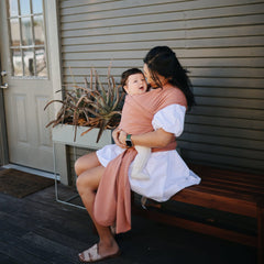 Mushie baby wrap cedar pocket storage shows convenient on-the-go diaper and key storage