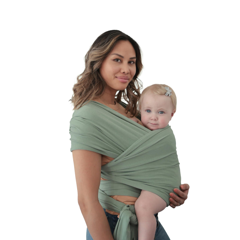 Mushie Baby Wrap Carrier Roman Green close-up fabric highlighting breathable organic cotton