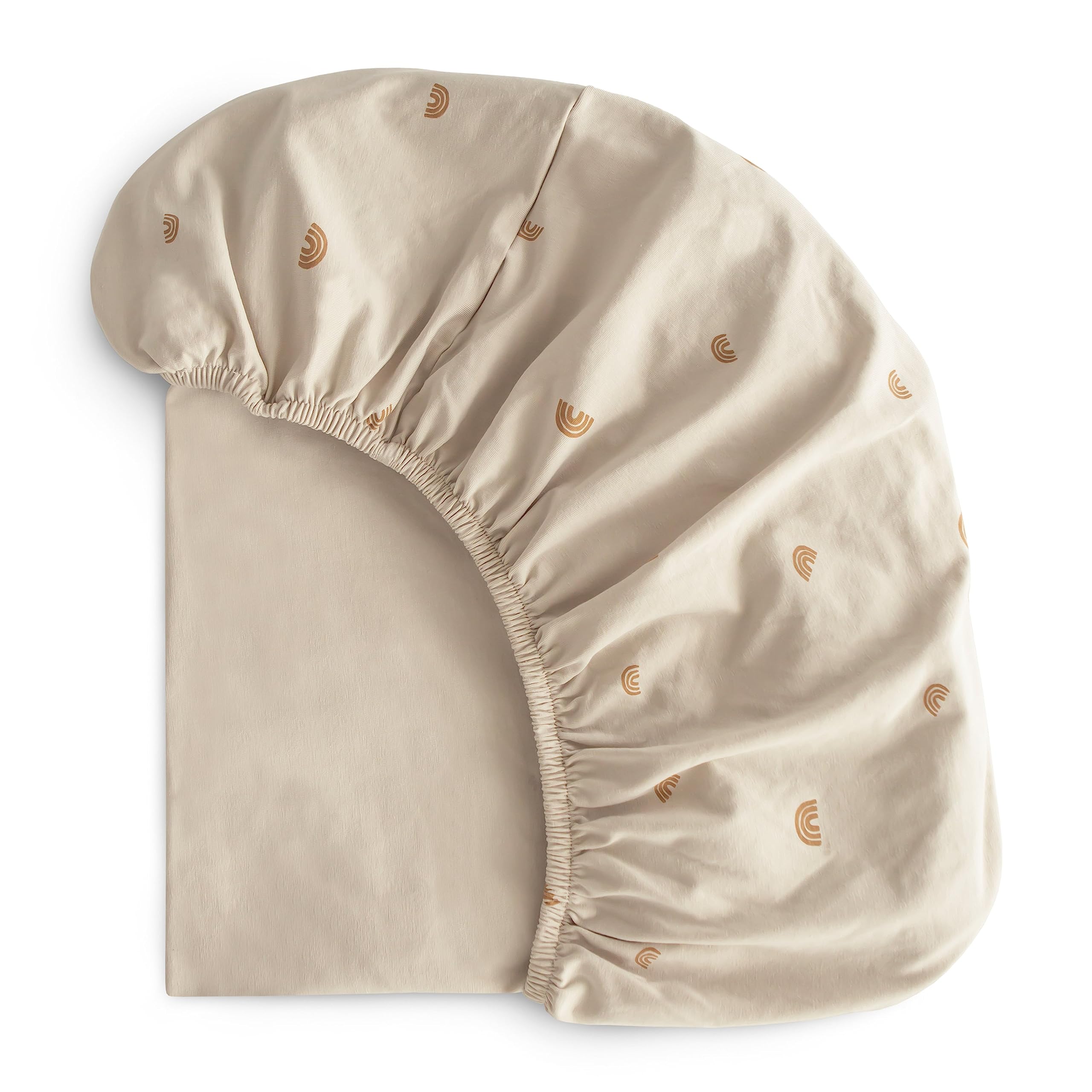 Mushie bassinet sheet elastic edges Rainbows show secure fit for gentle stretch.