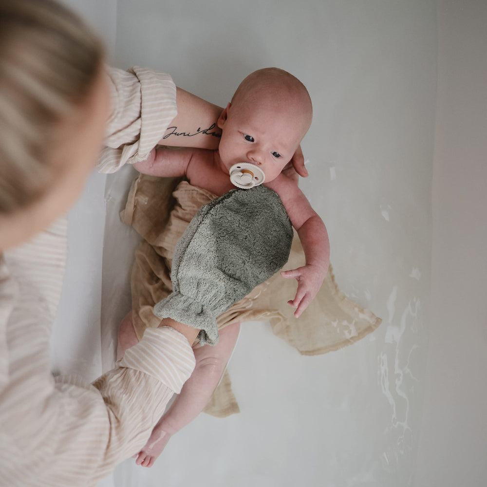Mushie bath mitt packaging in blush two-pack