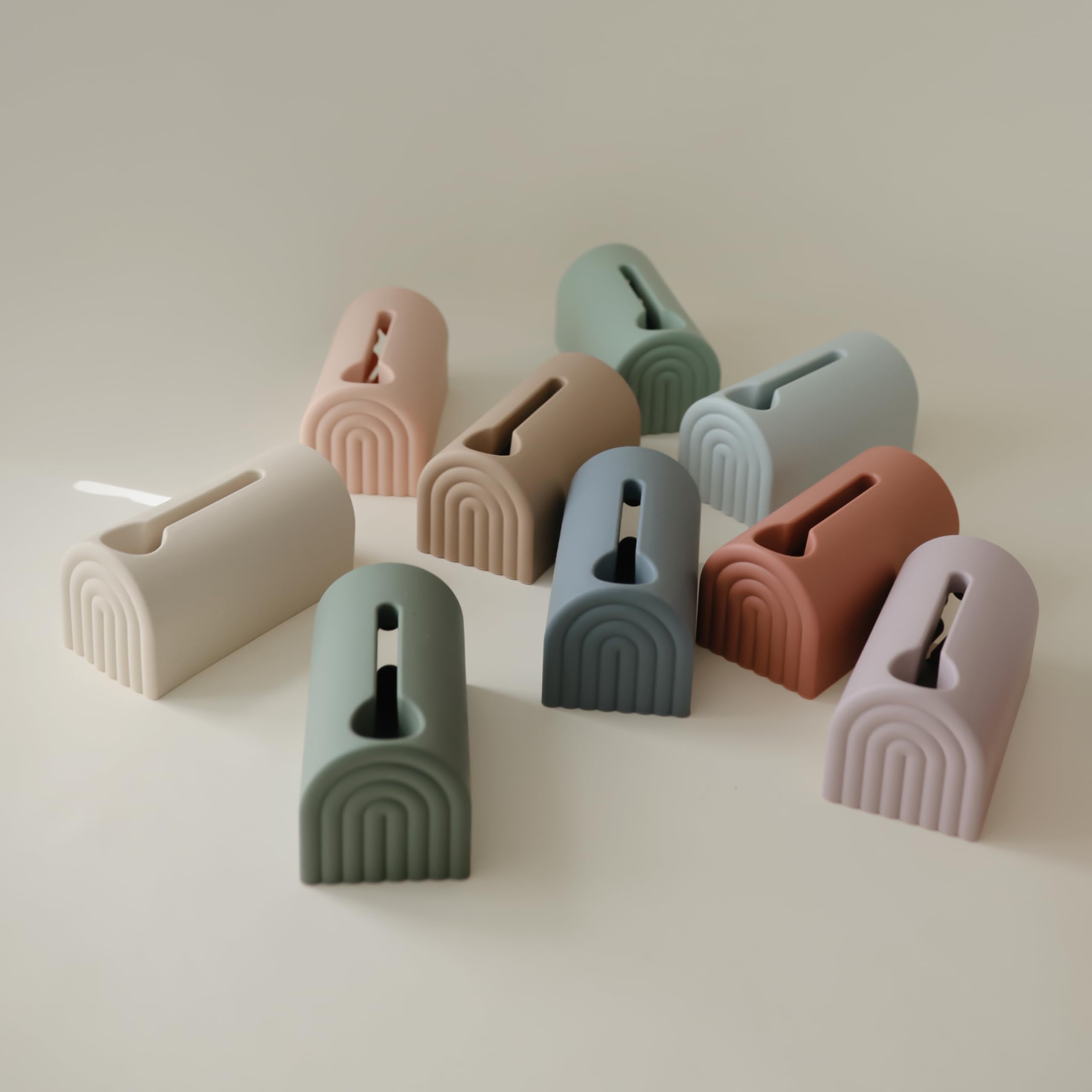 Mushie colorful bath-time arches add cheerful ambience to tub sessions