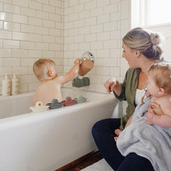 Mushie Bath Spout Cover Rose rainbow arches detail for playful bath time