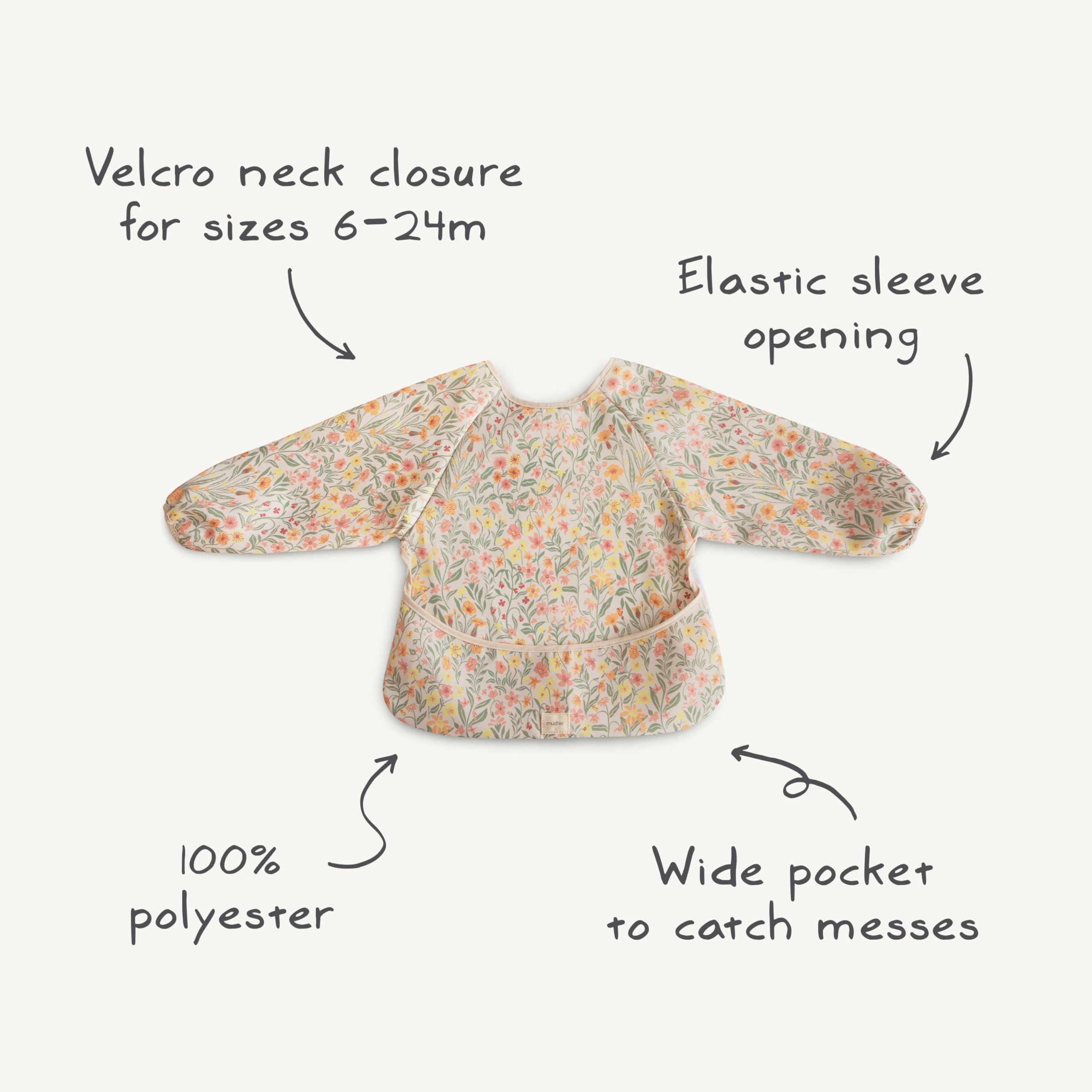 Mushie Bees long sleeve bib close-up reveals 100% polyester main fabric with cotton trim.